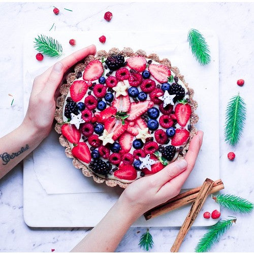 Raw vanilla bean flan with gingerbread crust